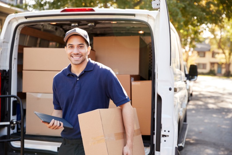 Van with a man service unloading boxes