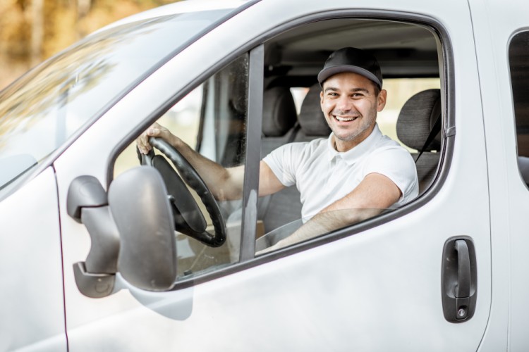 Van with a man service with a smile