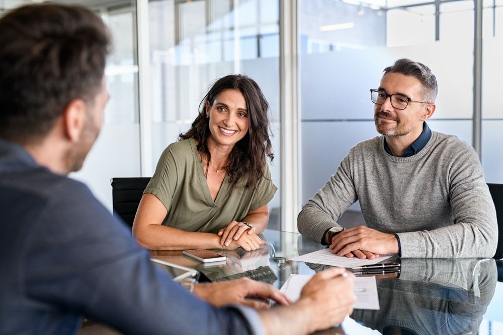 Couple discussing moving insurance options